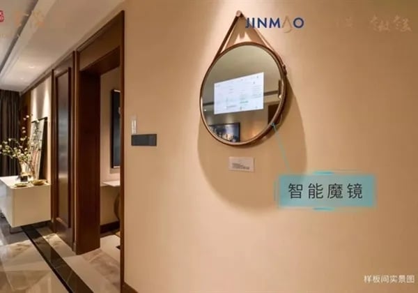 MIRROH smart bathroom mirror displaying weather in a luxury hotel suite